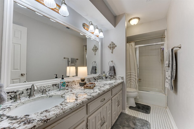 full bathroom with shower / tub combo with curtain, vanity, and toilet