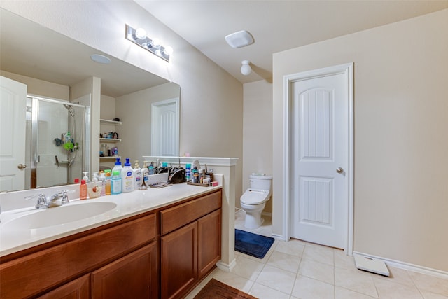 bathroom with walk in shower, tile patterned floors, toilet, and vanity