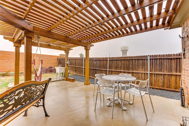 view of patio / terrace featuring a pergola