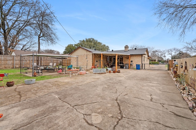 back of property with a patio area