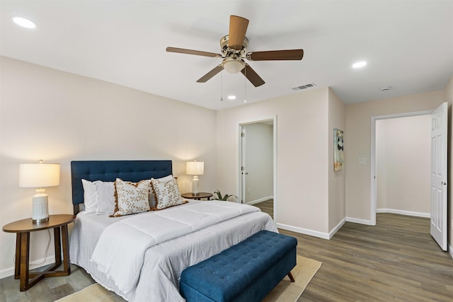 bedroom featuring hardwood / wood-style floors and ceiling fan