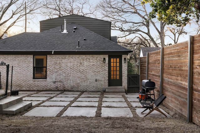 back of property featuring a patio