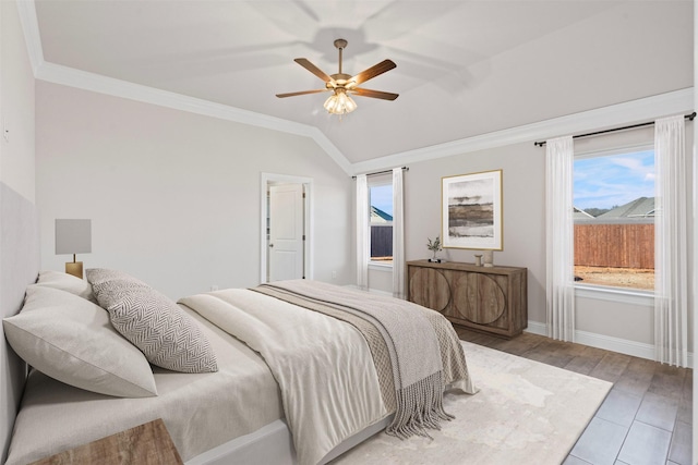 729 Jameson, Springtown, TX 76082 - bedroom featuring multiple windows, crown molding, baseboards, vaulted ceiling, and a ceiling fan
