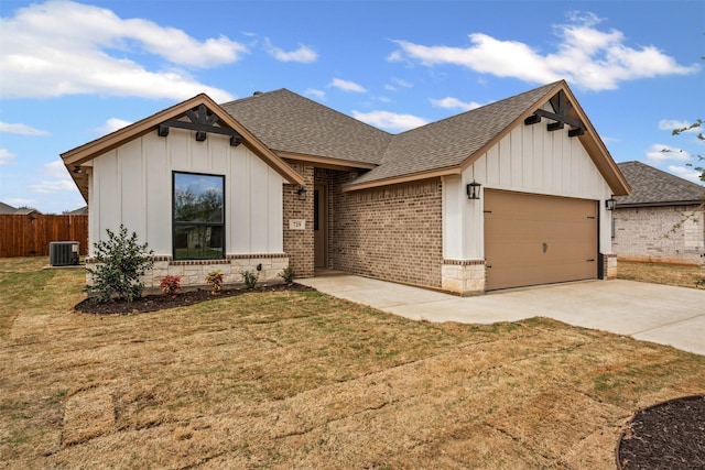 729 Jameson, Springtown, TX 76082 - view of front of home with roof with shingles, central air condition unit, board and batten siding, and an attached garage