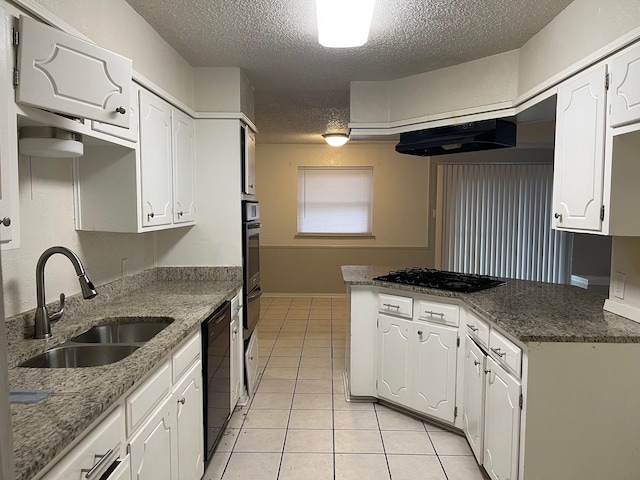 kitchen featuring extractor fan, kitchen peninsula, white cabinetry, sink, and black appliances