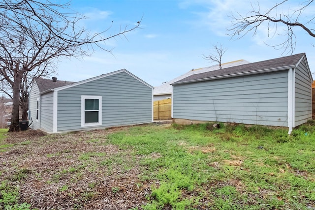 rear view of house with a lawn