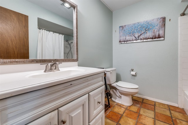 full bathroom featuring toilet, vanity, and baseboards