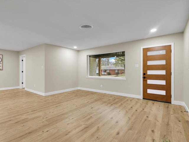 foyer entrance featuring light wood-type flooring