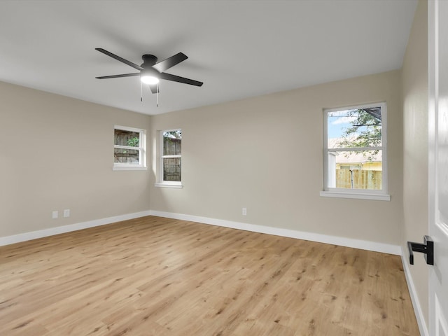 unfurnished room with light hardwood / wood-style flooring and ceiling fan