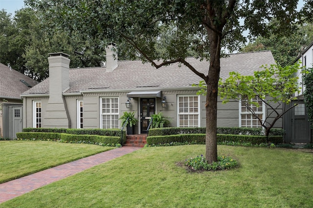 view of front of house with a front yard