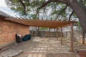 view of patio featuring a pergola