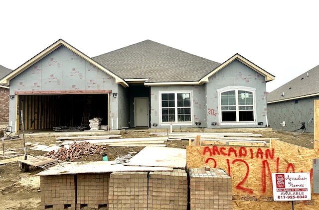 view of front of home featuring a garage