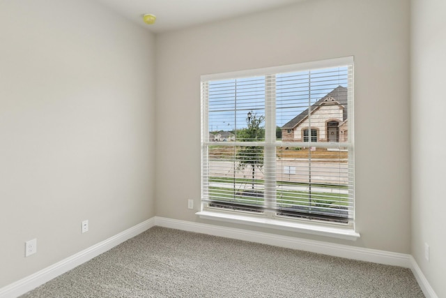 212 Navajo Trl, Alvarado, TX 76009 - empty room with carpet floors and baseboards