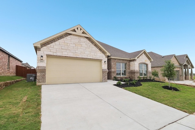 212 Navajo Trl, Alvarado, TX 76009 - view of front facade featuring brick siding, a garage, a front lawn, and concrete driveway