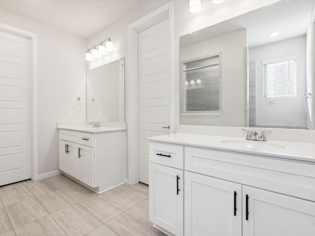 bathroom featuring vanity and a shower