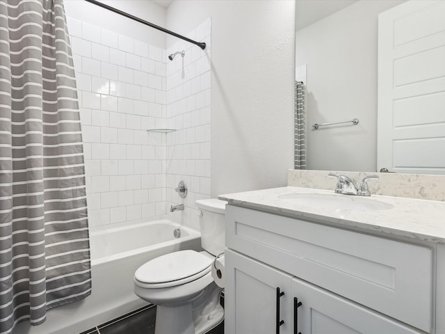 full bathroom with vanity, toilet, and shower / bath combo with shower curtain