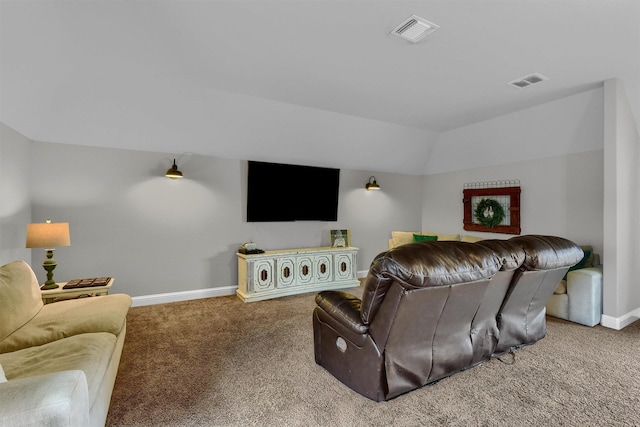 carpeted living room with lofted ceiling