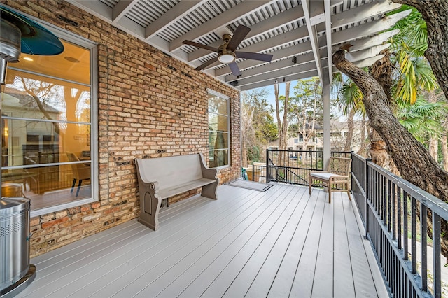 wooden deck with ceiling fan