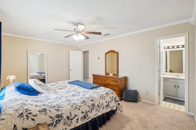 carpeted bedroom featuring a textured ceiling, ornamental molding, visible vents, and baseboards