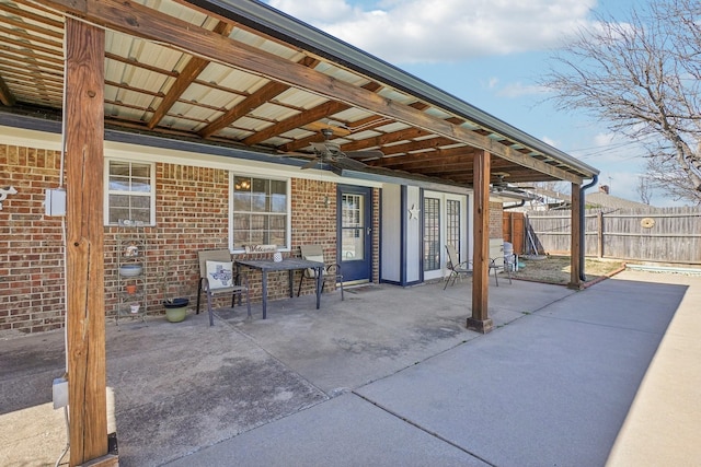 view of patio featuring fence