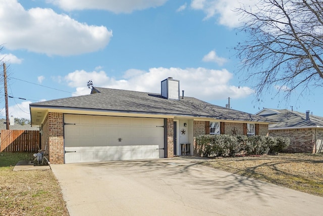 ranch-style home featuring an attached garage, brick siding, fence, driveway, and a chimney