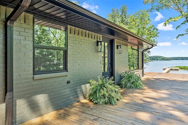 deck featuring a water view