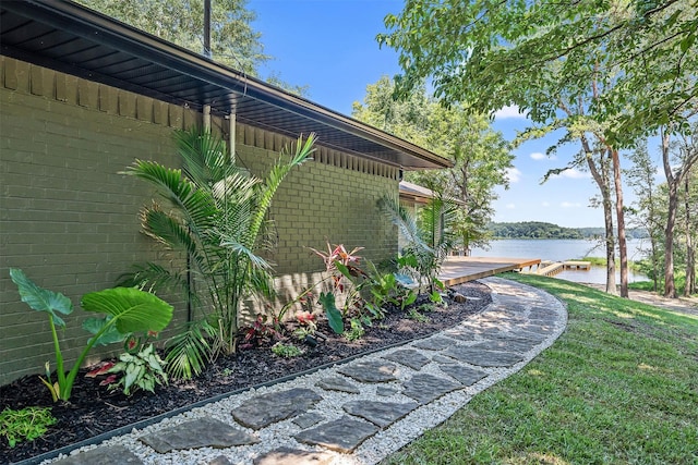 view of yard with a water view