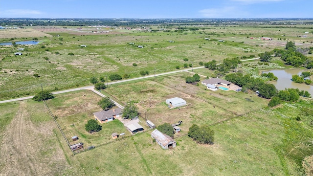 bird's eye view featuring a rural view and a water view