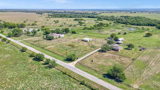 aerial view with a water view and a rural view