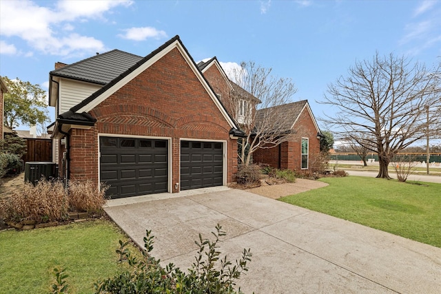 view of home's exterior with central AC, a garage, and a lawn