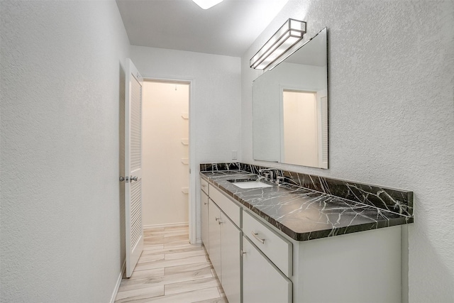 kitchen with sink and white cabinets