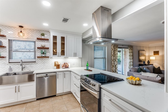 kitchen with white cabinetry, appliances with stainless steel finishes, sink, and island range hood