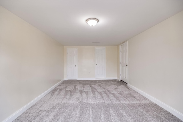 spare room with carpet flooring