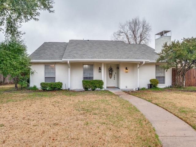 single story home with a front yard