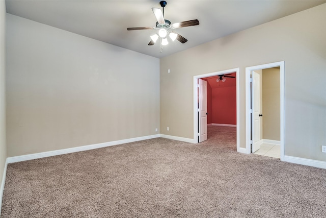 carpeted empty room with ceiling fan