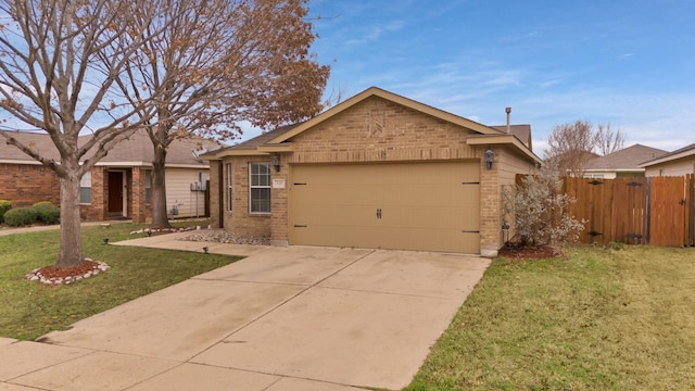 ranch-style home with a garage and a front lawn