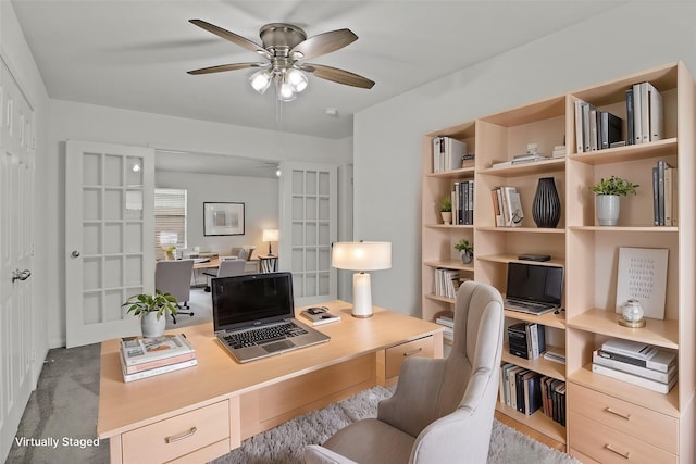 office space with ceiling fan