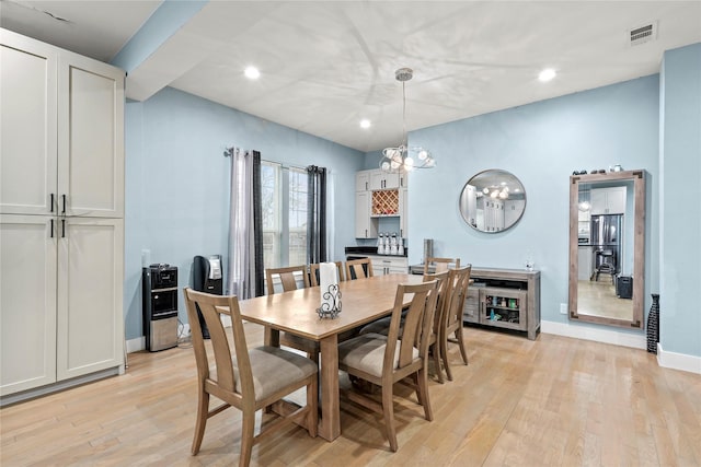 dining space featuring light hardwood / wood-style flooring