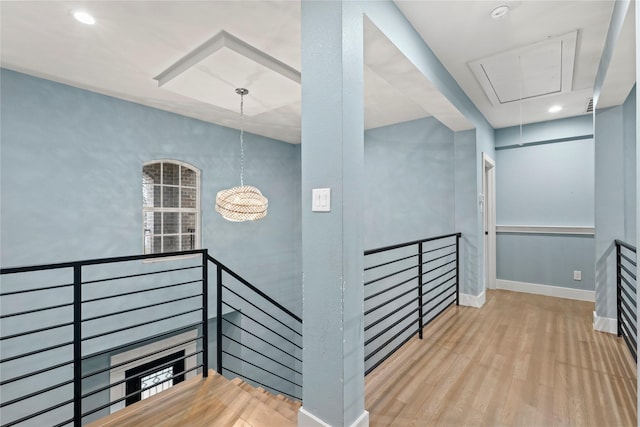 stairs featuring wood-type flooring