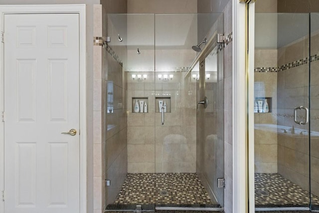 bathroom featuring walk in shower