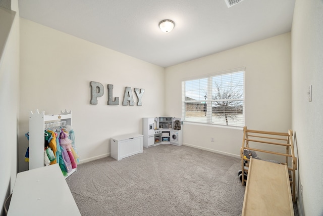 game room with light carpet