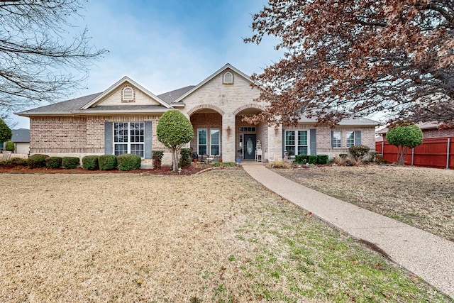 view of front of house with a front lawn