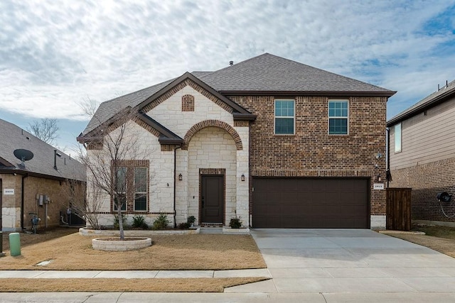 view of front of property featuring a garage