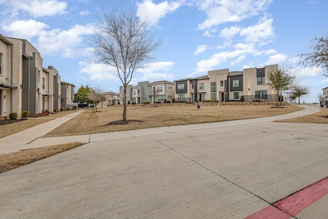 view of community with a yard