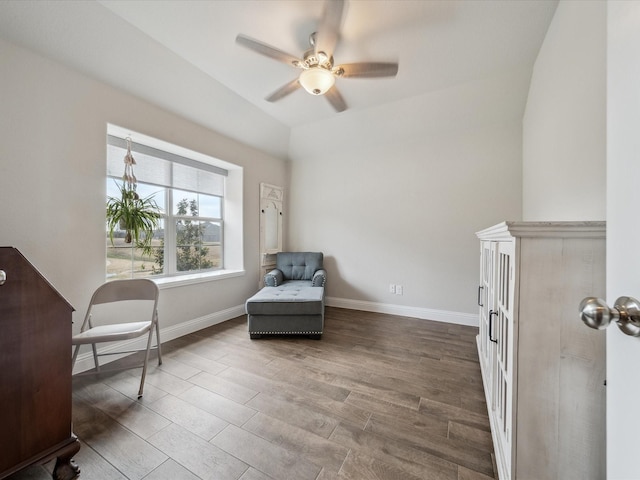 sitting room featuring ceiling fan, lofted ceiling, and hardwood / wood-style floors