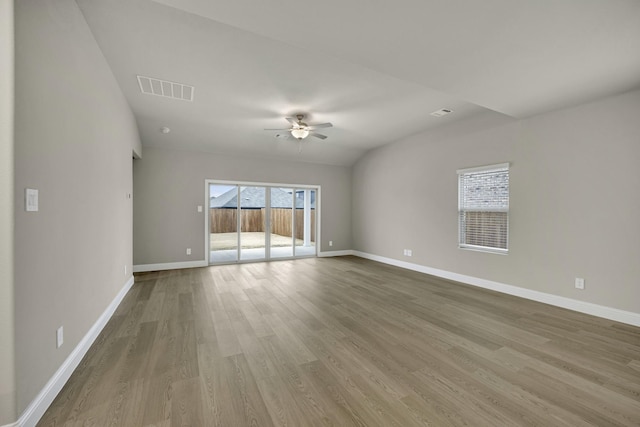 unfurnished room featuring light hardwood / wood-style floors and ceiling fan