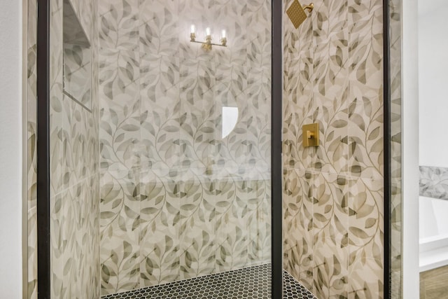 bathroom with a tile shower