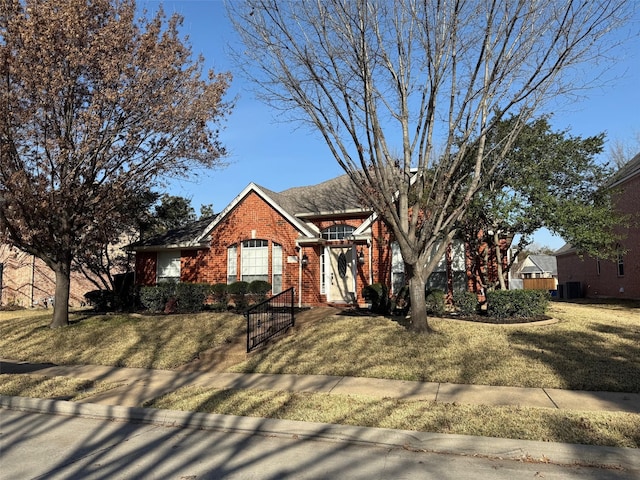 view of front of home with a front lawn