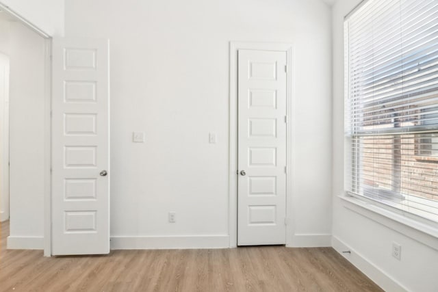 unfurnished bedroom featuring light hardwood / wood-style flooring