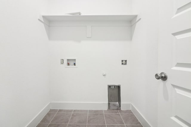 washroom with gas dryer hookup, tile patterned floors, and hookup for a washing machine